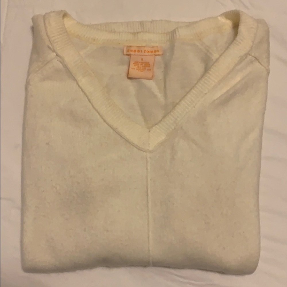 Cream colored long sleeve sweater